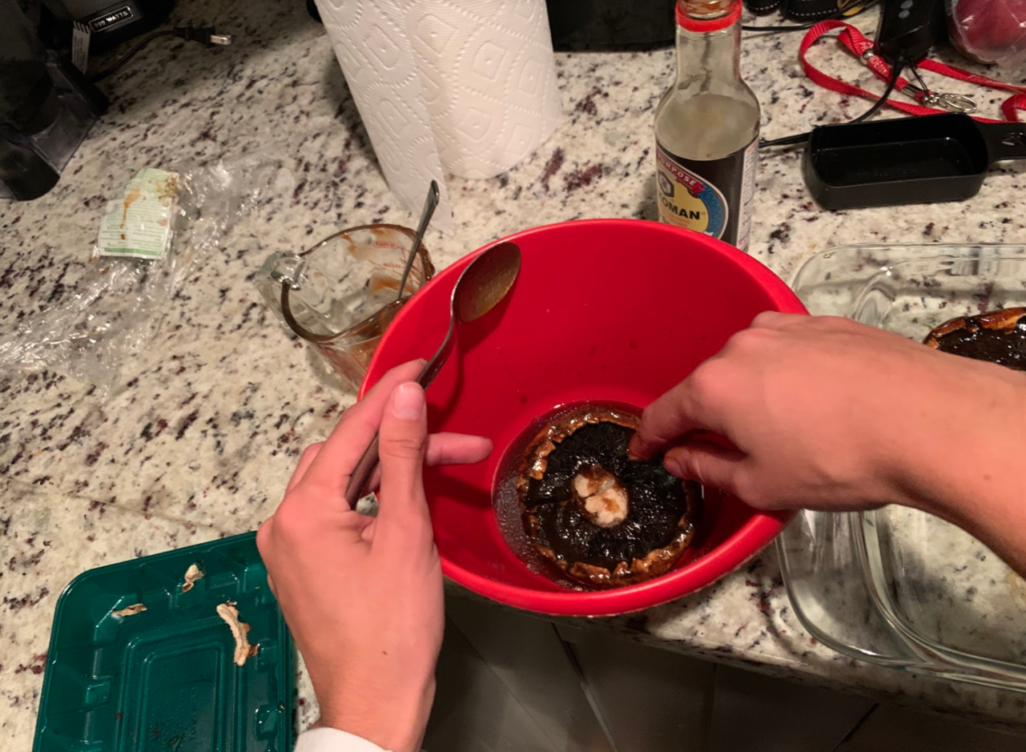 Image 2: Photo of portobello mushroom being dipped in marinade.